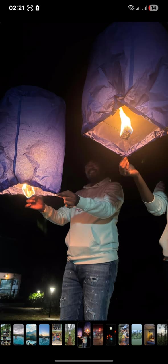 Guests releasing sky lanterns at night